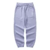 Stickade sportbyxor med tryckt logotyp i midjan ”Purple”